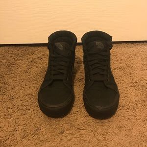 black vans high top sneakers